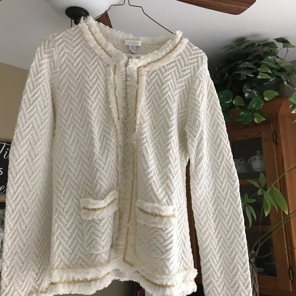Chico’s white with gold detail cardigan.